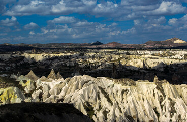 Cappadocia is a semi-desert region in central Turkey. It is famous for its fairy chimneys - tall cone-shaped rock formations, which are especially numerous in Pasabag Monks Valley and Goreme Valley.