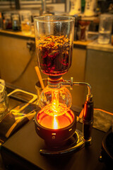 Siphon coffee maker on cafe bar