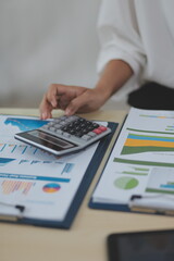 Business Documents, Auditor businesswoman checking searching document legal prepare paperwork or report for analysis TAX time,accountant Documents data contract partner deal in workplace office