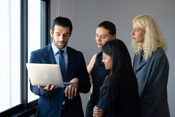 Business meeting - Meeting and talk about work while walking in the office hall. Group of friends meeting at home. Diverse business people asian woman and caucasian man discussion