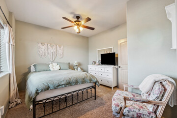 Cozy and inviting bedroom with soft colors and elegant decor in a tranquil home setting