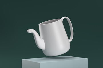 A white pitcher is upside down on a green surface