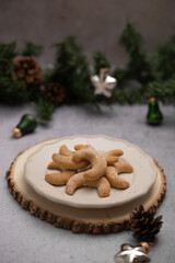 Delicious homemade Christmas cookies. Festive decorated sweets with decorations. Vanillekipferl are Austrian crescent-shaped biscuits made from almonds and hazelnuts. Austrian German cuisine