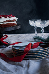 Delicious ready to eat wreath Christmas cake decorated with fresh cranberries and cream cheese frosting with festive styling