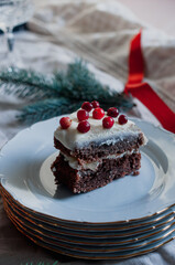 Delicious ready to eat wreath Christmas cake decorated with fresh cranberries and cream cheese frosting with festive styling