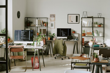 Office with ample space for working process of programmers,