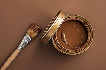 a painting brush lying on a can of paint, with a top view of the background with the color mousse mocha in a minimalist style with free space