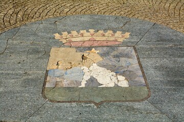 Weathered emblem of Albissola Marina