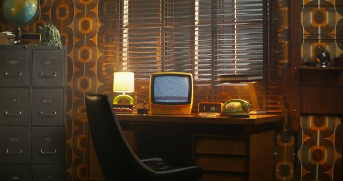 A monitor with ripples on the desktop screen. Retro office, interior details
