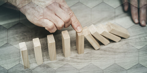 Concept of business control by stopping domino effect, geometric pattern