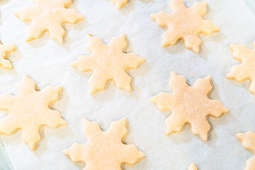 Baking Snowflake-Shaped Sugar Cookies for Homemade Christmas Gifts