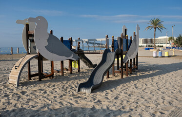 Children's playground on the main beach in the city of Alicante Spain
