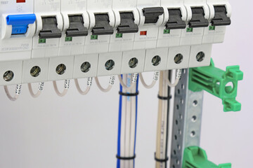 An electric current circuit breaker to protect electrical loads.