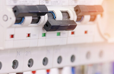 An electric current circuit breaker to protect electrical loads.