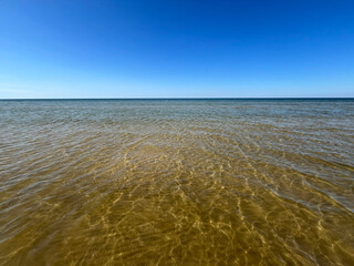 Seascape with clear sky horizon and no clouds