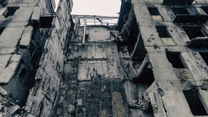 destroyed and burned houses in the city in Ukraine