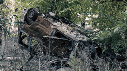 damaged and looted cars in a city in Ukraine