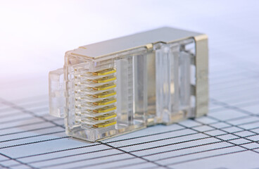 Rj45 connector for connecting a twisted pair cable. Data transmission over Ethernet. Soft focus. Close-up. 
