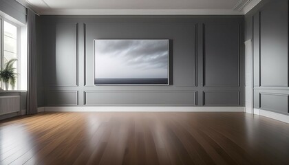 an empty grey room with hardwood flooring a white wall and a monochrome photography on the horizon the rectangle room has a clean and minimalist design