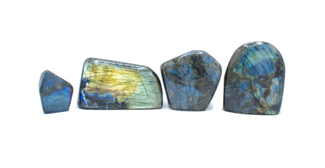 Labradorite is a calcium enriched feldspar mineral, rock, stone or gem first identified in Labrador, Canada, which can display an iridescent effect. Isolated on white background