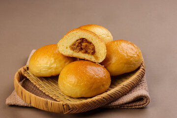 Pan De Coco is Filipino Coconut Bread Roll Uses Sweetened Shredded Coconut Meat as Filling.