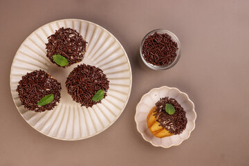 Chocolate Ensaymada is Filipino Soft Bread, Covered with Butter and Sugar then Topped with Chocolate Sprinkles. 