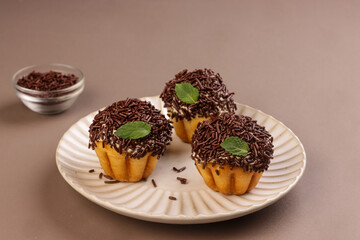Chocolate Ensaymada is Filipino Soft Bread, Covered with Butter and Sugar then Topped with Chocolate Sprinkles. 