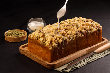 Pumpkin Bread Cake Topping with Pumpkin Seeds and Streusel.