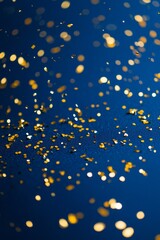 Blue background with scattered golden confetti