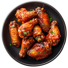 Top view of buffalo chicken wings on a dark ceramic plate isolated on a white transparent background
