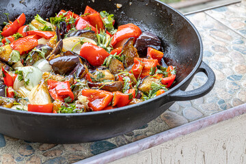 Grilled vegetable salad with zucchini, eggplant, onion, pepper and tomato