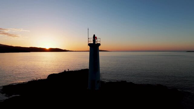 Aerial View Of Faro baliza do Lago During Sunset In Muxia, A Coru&ntilde;a, Spain.