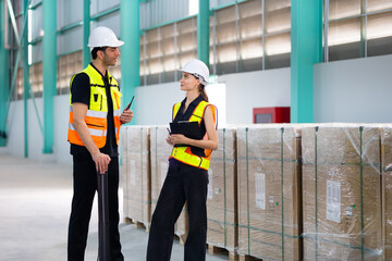 working woman. Caucasian woman warehouse staff Employees worker in Hard Hat working at large...