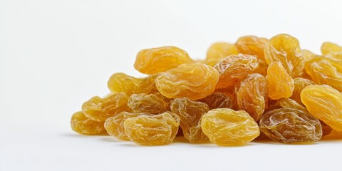 Dried yellow raisins displayed elegantly against a clean white background, showcasing the vibrant color and texture of these delicious dried raisins. Perfect for highlighting the appeal of yellow