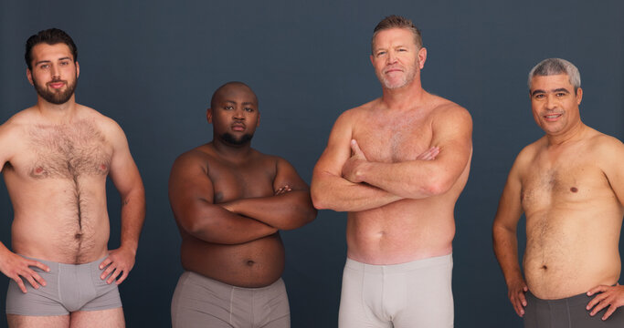 Diversity, body positivity and portrait of men in underwear with confidence, inclusion and unique identity in studio. Support, solidarity and male friends with pride, arms crossed and grey background