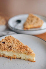 A piece of curd royal cheesecake on a white plate. Healthy dessert