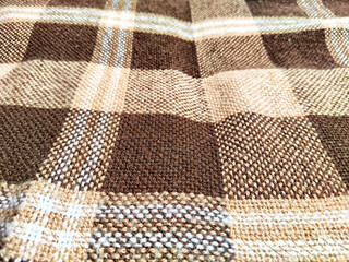 Beautiful textile pattern with a soft texture featuring brown and beige hues for your creative projects and designs
