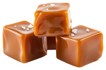 Three caramel cubes stacked and melted caramel chocolate dessert ketchup.
