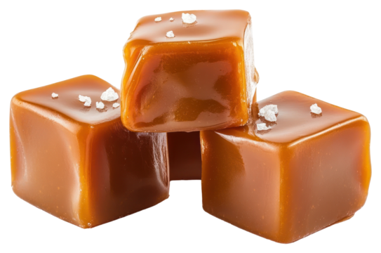 Three caramel cubes stacked and melted caramel chocolate dessert ketchup.
