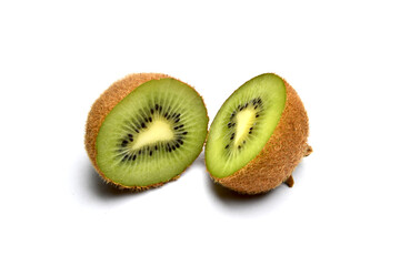 Kiwi cut in half. Two halves of kiwi. Tropical fruit. Isolated on white background