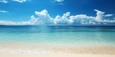 Fototapeta premium Stunning views of clear blue beaches accompanied by beautiful skies create a picturesque scene. Experience the beauty of these clear beaches and their captivating blue waters for a perfect getaway.