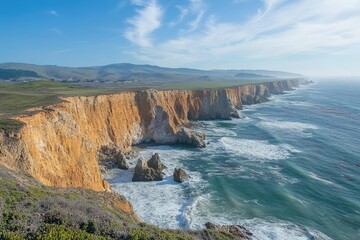 Obraz premium Striking rock formations meet the powerful pacific ocean waves along the scenic california coastline