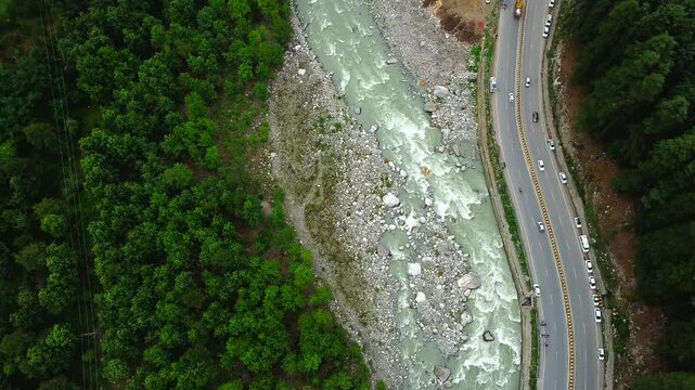 Aerial view of manali with the beas river and national highway 3 in himachal pradesh India. Small villages and colourful local houses nestled in the hills of manali himachal pradesh India.