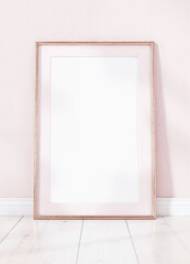 Minimalist Rose Gold Frame on White Textured Wall in Scandinavian Style