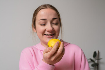 Girl with braces eat apple fruit