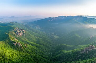 Majestic Mountain Range at Dawn, Lush Green Forest Valley
