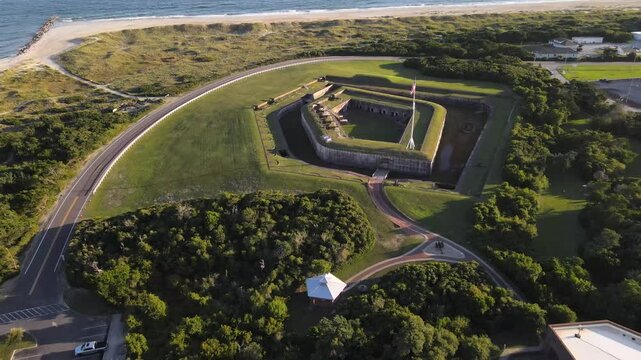 Fort Macon walls and Civil War cannons from a bird's eye view in a national park in North Carolina.