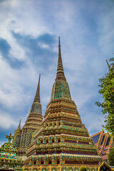 Fototapeta premium Picture of pagodas in Wat Pho in Bangkok, Thailand, one of Thailand's oldest temples.