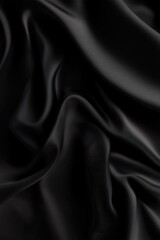 Fototapeta premium Black fabric with a pattern of lines and swirls. The fabric is very thick and has a shiny appearance