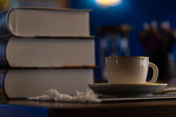 tea cup and books on the table